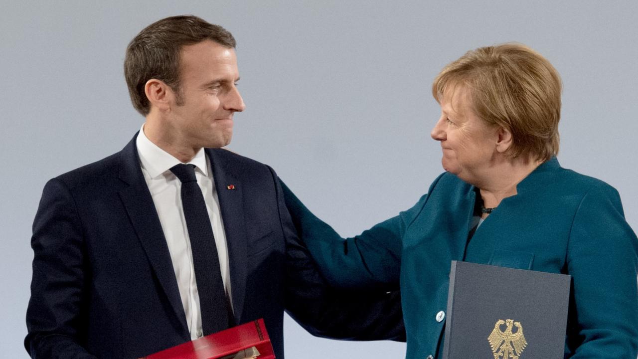 Frankrikes president Emmanuel Macron och den tyska förbundskanslern Angela Merkel under signeringen av Aachenavtalet. 