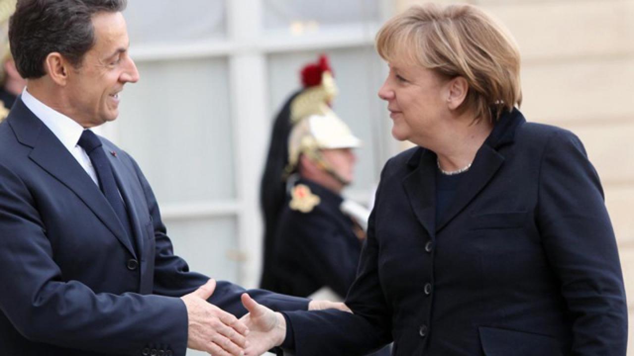 Frankrikes president Sarkozy och Tysklands förbundskansler Merkel är överens om hårdare budgetregler inför toppmötet.