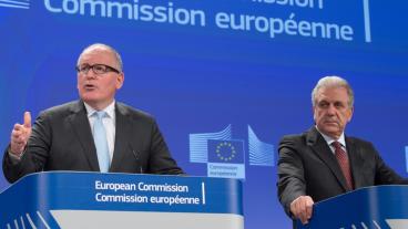 Frans Timmermans och Dimitris Avramopoulos.